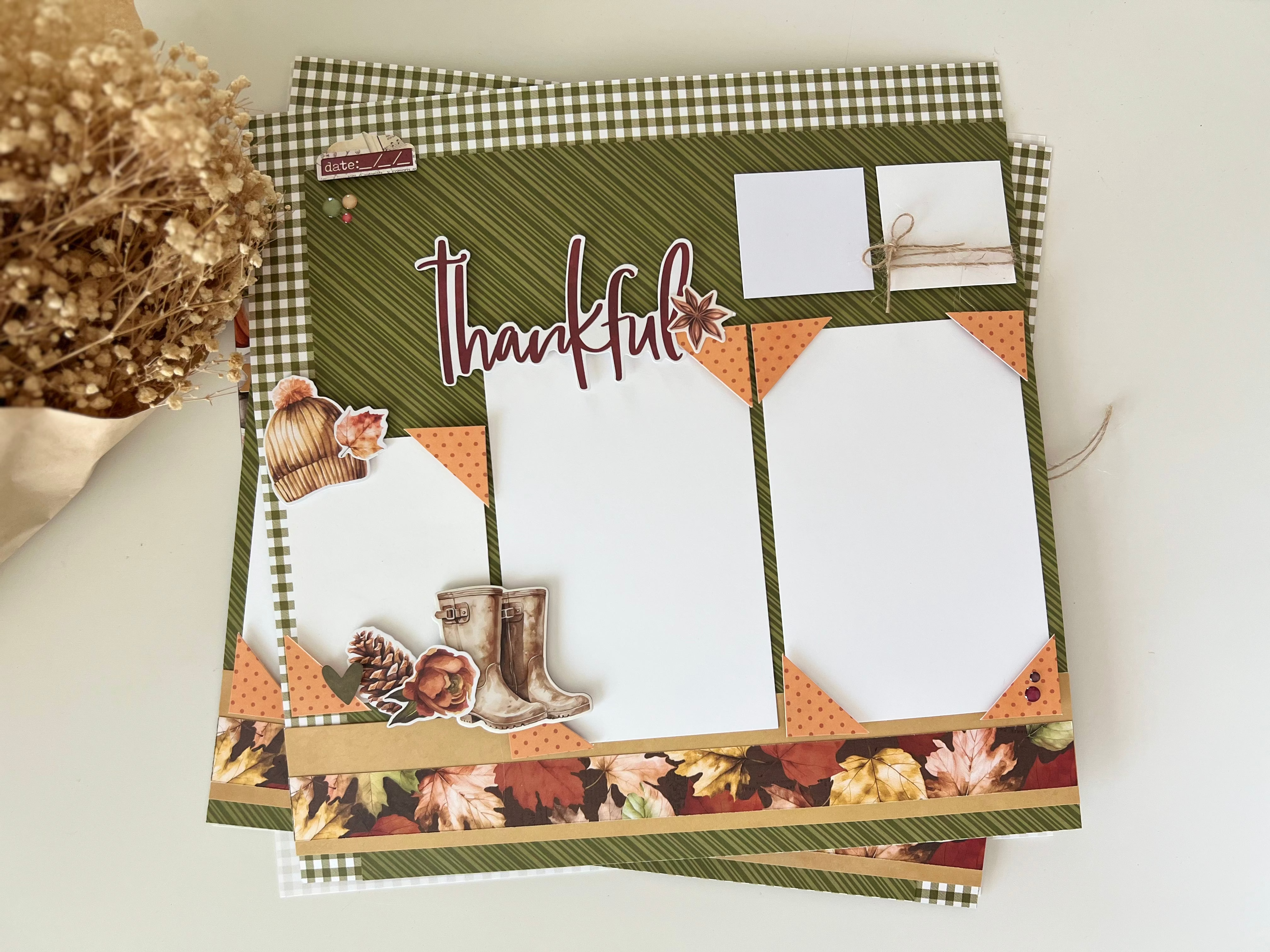 Thankful scrapbook page with autumn-themed elements on a white surface.