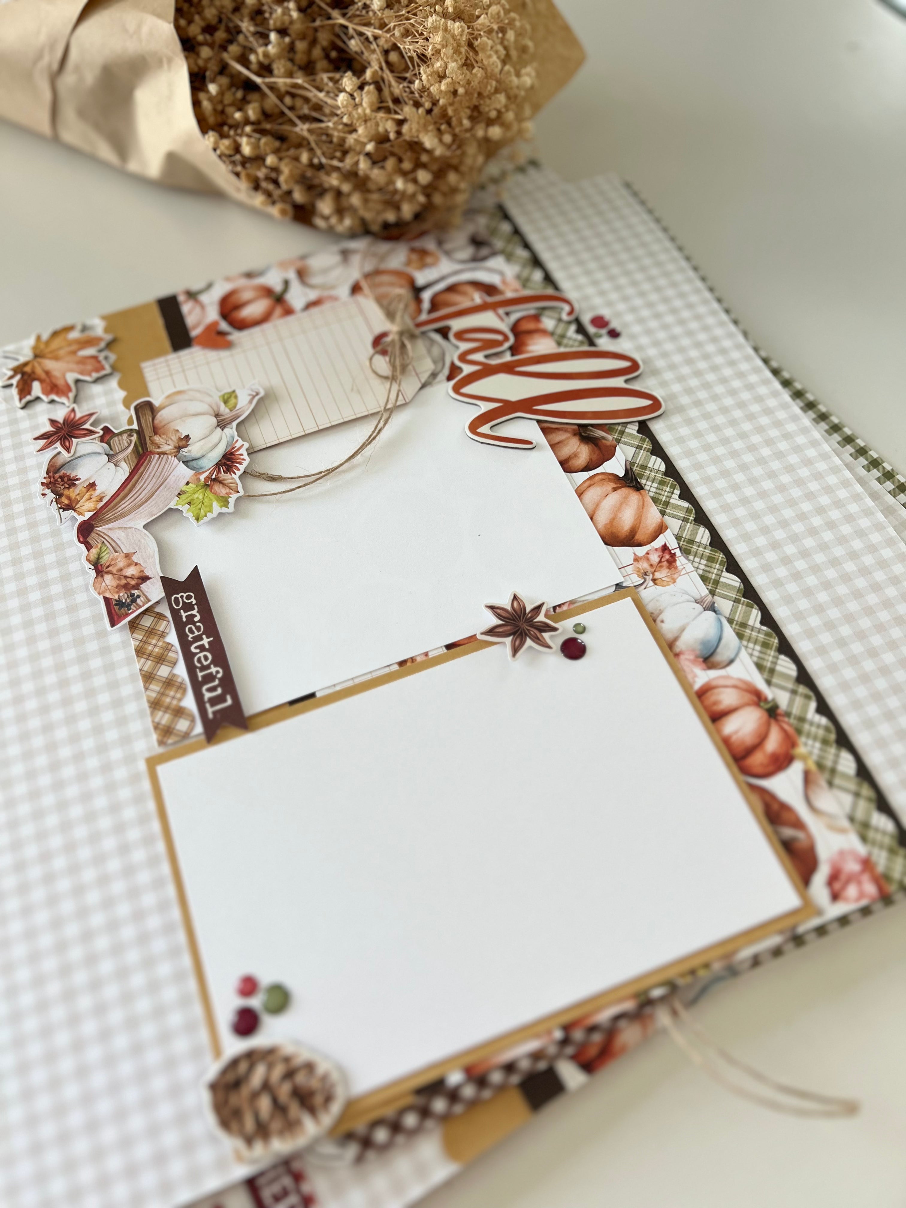 Decorative paper with autumn-themed designs on a checkered surface