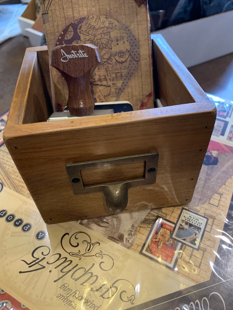 Wooden drawer with metal drawer pull
